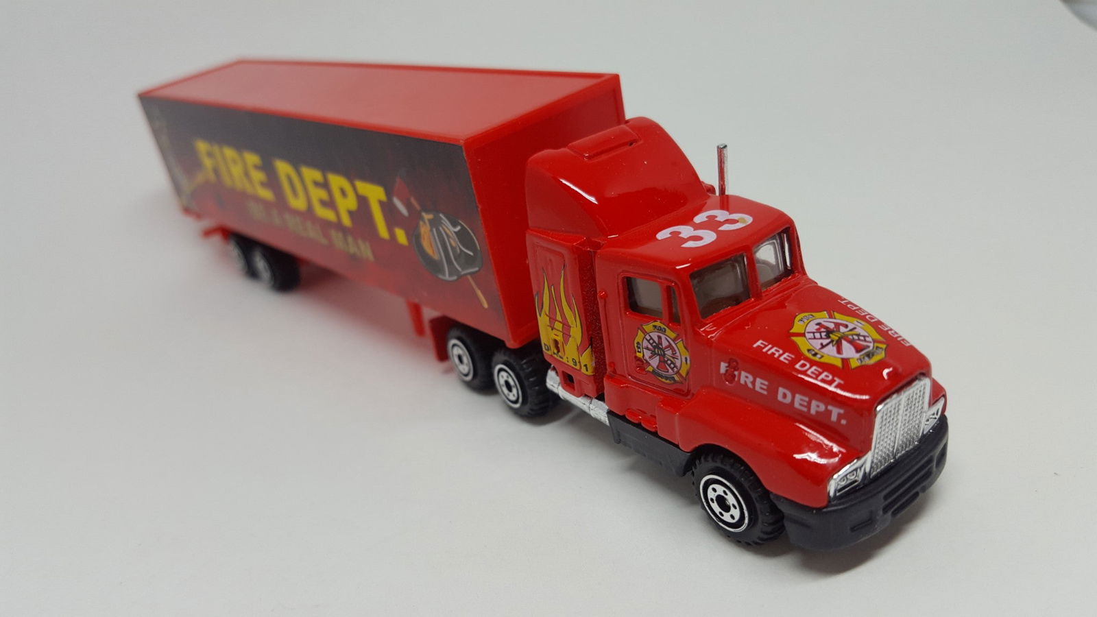 ProEngine Street Machine HO 1/87 Fire Dept LH Tractor FD "Be a Real Man" Trailer - ModelsPower