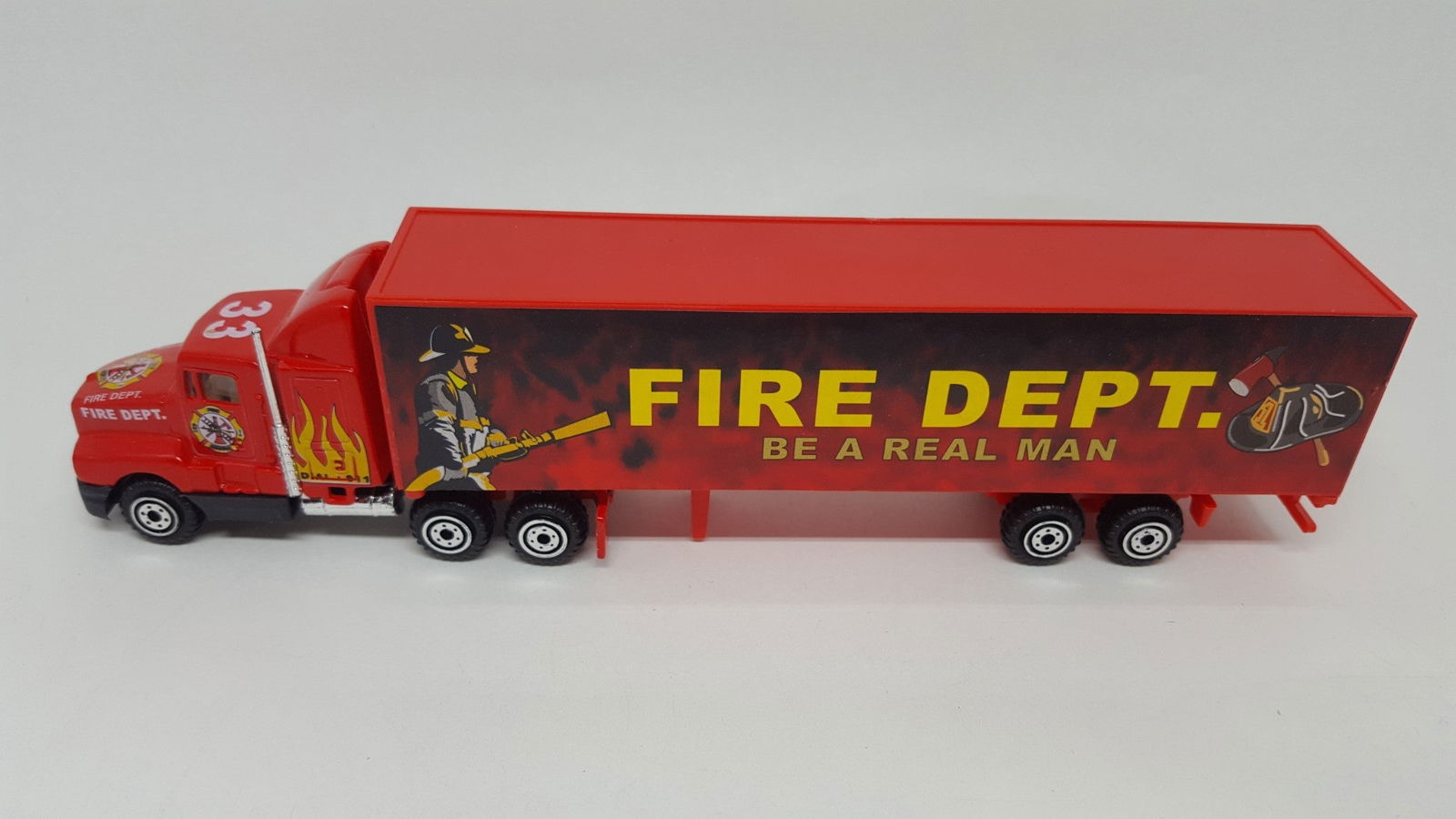 ProEngine Street Machine HO 1/87 Fire Dept LH Tractor FD "Be a Real Man" Trailer - ModelsPower