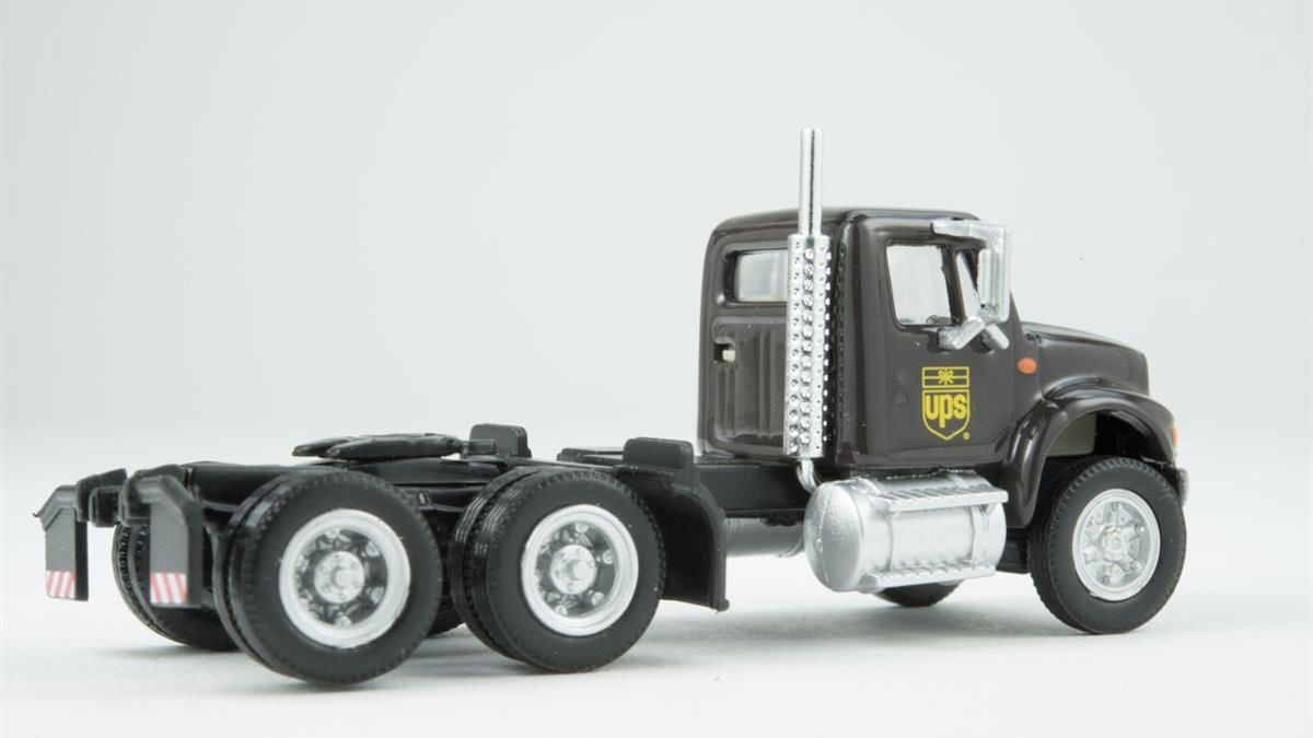 Walthers HO 1/87 UPS International 4900 Dual-Axle Semi Tractor w/ Bowtie Shield - ModelsPower